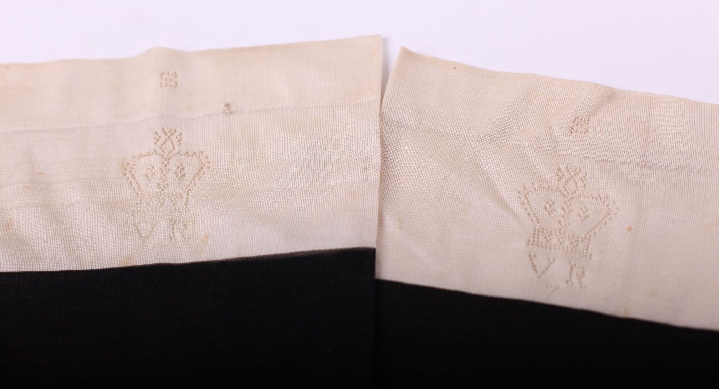 VICTORIA — Extraordinary pair of Queen Victoria's black & ivory silk monogrammed stockings | Sophie Dupré Autographs