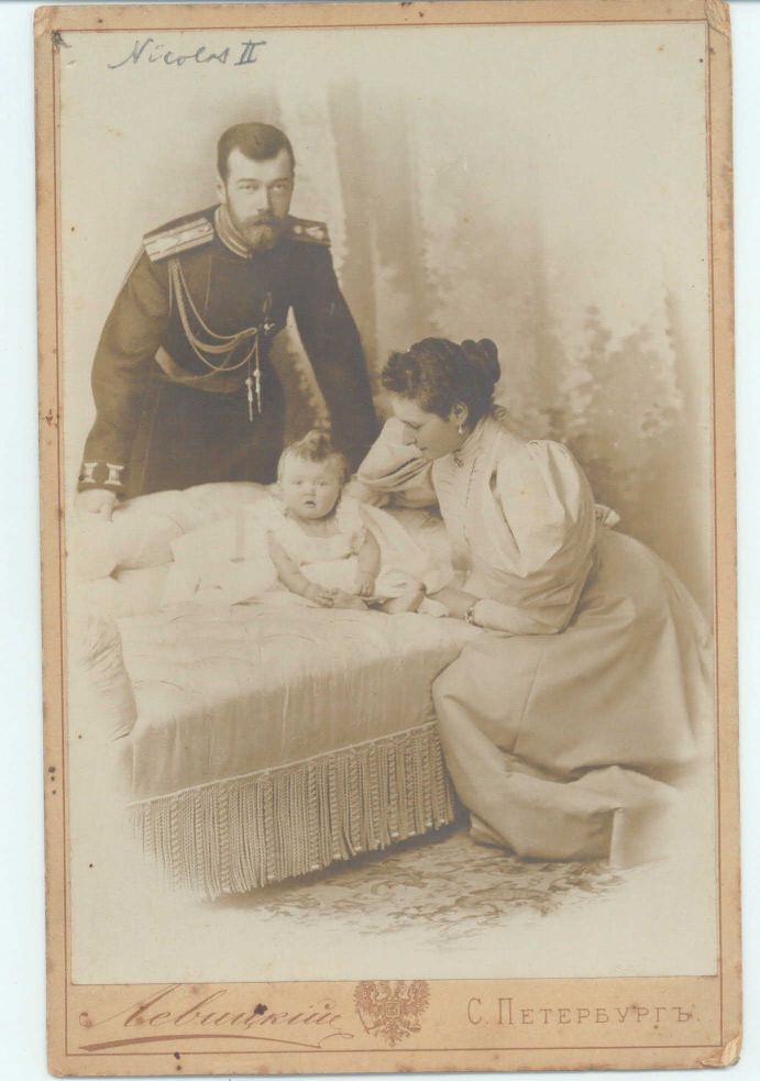 (1868-1918, Tsar of Russia from 1894, Assasinated after the Revolution), ALEXANDRA FEODOROVNA (1872-1918, the Tsarina) with their daughter Grand Duchess OLGA, (1895-1918)] — Sophie Dupré Autographs